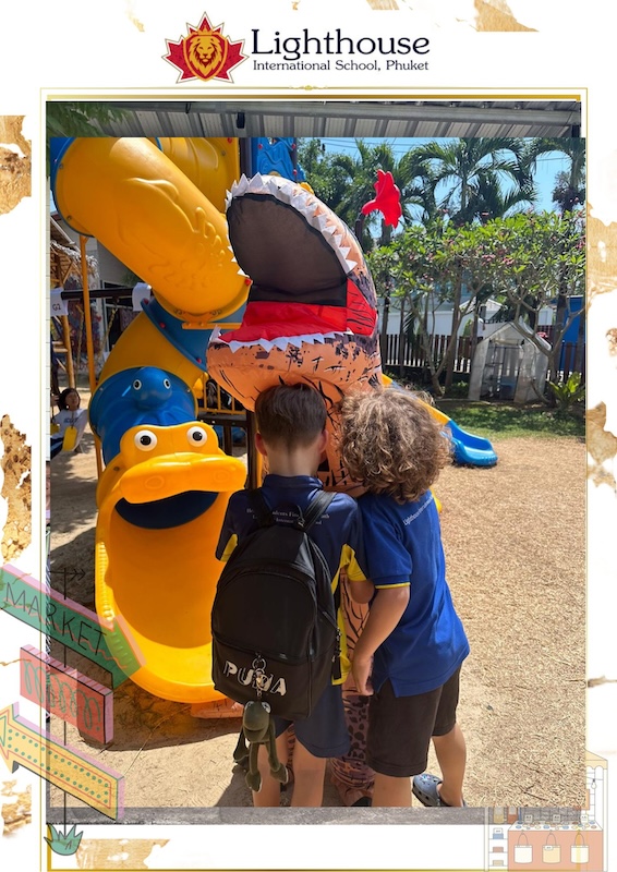 Kids play with dinosaur