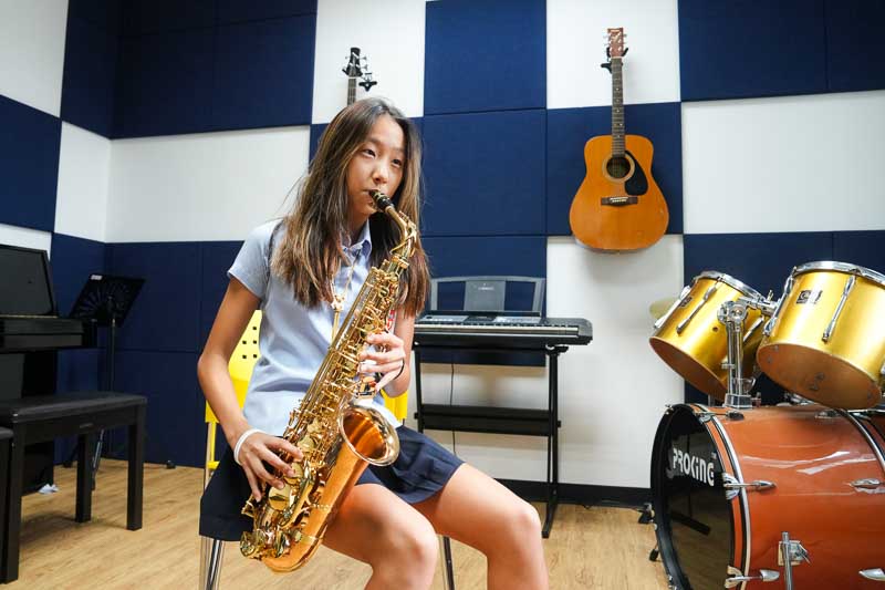 BISP - student playing the saxaphone