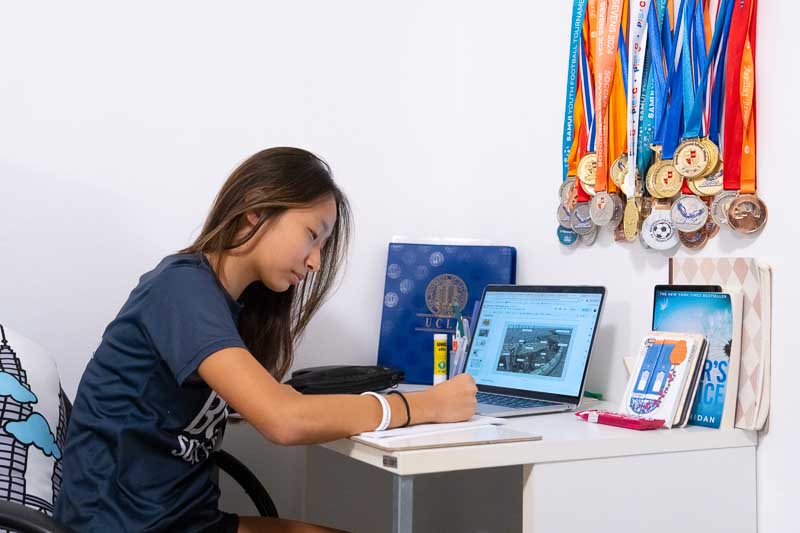 BISP - student at desk